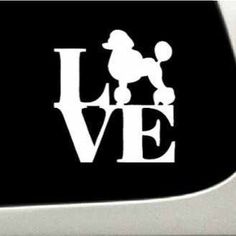 the love poodle decal is shown in white