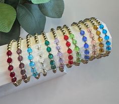 Beautiful birthstone stackable bracelets are made with 14k gold dipped beads with your birthstone gems. We can also put multiple birthstone on one bracelet. Message us for more details.                                                              To know what size, measure your wrist circumference. Add one inch to that measurement for comfort. Always roll your bracelets on and off to prevent stretching. Everyday Hypoallergenic Crystal Bracelet With Round Beads, Adjustable Rondelle Stretch Bracelet Gift, Adjustable Rondelle Stretch Bracelet As Gift, Gold Stackable Crystal Bracelet For Gifts, Gold Stackable Crystal Bracelet Gift, Adjustable Faceted Crystal Bracelet For Everyday, Adjustable Stackable Crystal Bracelet, Adjustable Stackable Round Crystal Bracelet, Adjustable Birthstone Beaded Bracelets For Anniversary