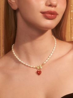 Editor's NotesENGBROX's jewelry is gorgeous and perfect for everyday wear.- Light-weighted- Eye-catching heart pendant detail- Pearl chain band- T-bar closure- Minimal and feminine stylesMeasurements(in.)- Size: 16.14in. (L)- Pearl: 0.28in. (W)- Pendant: 0.05in. (W) / 0.05in. (L)- Weight: 0.69oz.Composition & Care- Brass  Epoxy  Freshwater Pearl- Avoid direct heat and moisture- Professional cleaning is recommendedDesigner- by ENGBROX Toggle Necklace, Professional Cleaning, Pearl Chain, Men Shoes Size, Feminine Style, Mens Bottom, Heart Pendant, Freshwater Pearls, Size 16