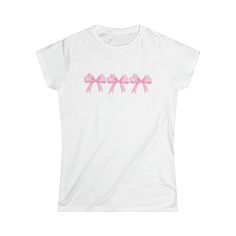 Elevate your wardrobe with our Y2K Coquette Charm Women's T-Shirt, a perfect blend of classic comfort and contemporary style. 🎀 Designed for the modern coquette, this softstyle tee brings a touch of femininity to the classic tee silhouette. The sleeves are slightly shortened, revealing a hint of shoulder for a flirtatious twist on a timeless favorite. ✨ Crafted from 100% ringspun cotton (fiber content may vary for different colors), this tee offers a luxurious feel against your skin while maintaining its lightweight comfort at 4.5 oz/yd² (153 g/m²). The semi-fitted design effortlessly complements your curves, making it a versatile addition to any outfit. 👕 To ensure durability and longevity, we've reinforced the shoulders with twill tape, and the collar seam is strengthened with ribbed k Modern Coquette, Blush Collection, Shirt Coquette, Shirt Silhouette, Bow Women, Coquette Y2k, Y2k Coquette, Shirt Y2k, Concert Fits