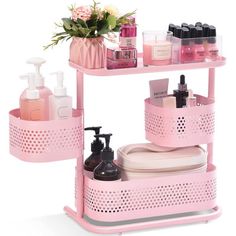 a pink shelf with two shelves holding cosmetics and toiletries