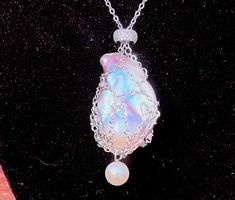 Beautiful 😍Multicolored Rare Baroque pearl super high luster ✨ in an elegant .925 sterling silver pouch necklace with dangling white pearl $150 shipped tracked/insured Zelle, Venmo, PayPal, and CashApp accepted! Elegant Iridescent Necklace For Parties, Luxury Silver Teardrop Pearl Necklace, Silver Baroque Pearl Necklaces For Parties, Elegant Iridescent Jewelry With Pearl Charm, Silver Baroque Pearl Necklace For Parties, Exquisite Silver Necklace With Pearl Drop, Exquisite Silver Pearl Drop Necklace, Exquisite Silver Pearl Necklace Gift, Exquisite Silver Pearl Necklace For Gifting