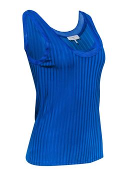 Get summer ready with Sandro's blue ribbed tank. This sleeveless tank features a blue ribbed knit for a stylish touch. Perfect to style with denim shorts or linen pants and slide sandals for a effortless and chic look. Don't miss out! Size S (1) Shell 96% Viscose, 4% Elastane Trim 100% Viscose Unlined Pullover Ribbed knit Bust 28" Waist 29" Shoulder to hem 24.5" Summer Ribbed Fitted Tank Top, Summer Stretch Ribbed Tank Top, Fitted Ribbed Tank Top For Summer, Casual Ribbed Tank Top For Spring, Summer Ribbed Stretch Tank Top, Ribbed Stretch Tank Top For Summer, Trendy Ribbed Tank Top For Spring, Stretch Ribbed Tops For Summer, Trendy Ribbed Tank Top For Summer