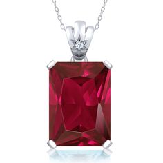 PRICES MAY VARY. Exquisite Red Created Ruby: This pendant necklace features a captivating 18x13mm emerald-cut red created ruby gemstone. The deep red hue of the ruby exudes elegance and passion, making it a stunning centerpiece of the necklace. Impressive 20.03 Carat Total Weight: With a total weight of 20.03 carats, this pendant necklace offers a substantial presence that captures attention and showcases the beauty of both the red created ruby and white topaz gemstones. Premium 925 Sterling Sil Ruby Pendant Necklace, Black Diamond Pendant, Ruby Necklace Pendant, Ruby Pendant, Diamond Pendant Necklace, Gem Stone, Topaz Gemstone, Fine Jewellery Necklace, White Topaz