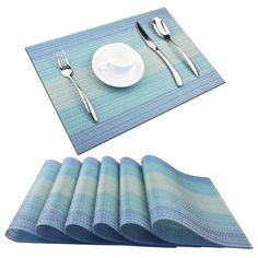 placemats, forks and spoons on a table set for four with blue stripes