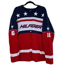 Great Preowned 1990’s Vintage Condition With Some Very Light Wash Wear On The Blue Fabric Brand: Hilfiger Athletics By Tommy Hilfiger Size: Mens Large Rare 90s Vintage Patriotic Hockey Red, White, Blue Embroidered Star And #16 Hilfiger Spell Out Long Sleeve Jersey * All Measurements Are Taken While Item Is Laying Flat And Are Approximate * Pit To Pit: 24” Waist: 23.5” Sleeve: 20” Length: 28.5” From Top Of Shoulder To Hem (Sum) 90s Red Long Sleeve Tops, 90s Style Red Tops For Winter, Red 90s Style Winter Tops, Long Sleeve Tops With American Flag Print For Winter, Winter Long Sleeve Tops With American Flag Print, Vintage Patriotic, 2000s Fashion Outfits, Long Sleeve Jersey, Hockey Jersey