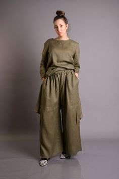 "Linen Pants, Women Pants, Linen Harem Pants Military  100% linen pants of high quality linen. The pants are very comfortable. They have four pockets, Elastic wais.  They have a sporty elegant style.  Loose fitting. The pants are available in a wide variety of colors. Model is wearing size S Heigth: 176 cm- 5\"9 inches Color: Dark Green Fabric: Linen 100% ►Quality NATURAL linen fabric. medium weight (200 g) linen fabric Express shipping 2-7 days with DHL. You can buy your DHL link here. https://www.etsy.com/listing/713478996/dhl-express-delivery-please-dont-forget?click_key=9e522509ed6b588cfa22bf7f44c0acb01f2a2025%3A713478996&click_sum=e283a020&ga_search_query=dhl&ref=shop_items_search_1  Custom Orders We could customize the garments. We can adjust the length of the skirt and pants, or the Khaki Straight Pants With Loosely Fitted Hips, Khaki Straight Cargo Pants, Workwear Sets With Pockets, Khaki Relaxed Fit Harem Pants For Work, Khaki Linen Pants With Elastic Waistband, Loosely Fitted High-waisted Khaki Harem Pants, Khaki Wide Leg Ankle-length Pants With Relaxed Fit, Khaki Wide Leg Ankle-length Pants With Loose Fit, Khaki Wide Leg Pants With Relaxed Fit