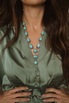 We have always loved a beautiful statement necklace, but this one is so beautiful and different! Sterling silver Turquoise stones Measures 19 inches with 3 inch drop Comfortable to wear Intricate silver detailing around stones Please measure your neck before ordering. Wedding Turquoise Jewelry, Elegant Turquoise Jewelry With Stones, Elegant Turquoise Stone Jewelry, Turquoise Bridal Jewelry, Turquoise Statement Necklace Outfit, Sterling Silver Necklaces With Stones, Turquoise Stones Necklace, Sterling Silver Turquoise Necklace With Stones, Elegant Turquoise Necklace