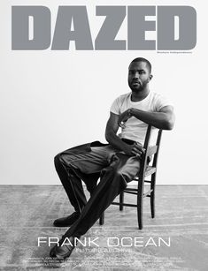 a man sitting in a chair on the cover of dazed