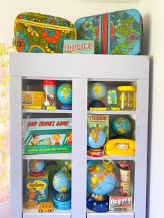 the shelves are filled with various children's toys