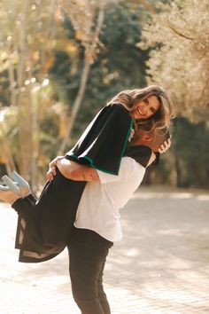 a man is holding a woman on his back