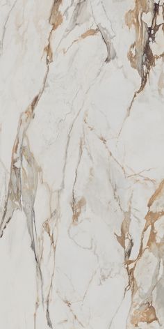 a white and brown marble textured wallpaper