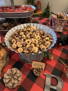 a table topped with lots of different types of cookies and desserts on top of it