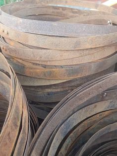 several large metal tubs stacked on top of each other