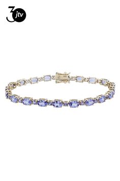 7.60ctw Oval And 1.20ctw Round Blue Tanzanite 10k Yellow Gold Tennis Bracelet. Measures Approximately 0.18"W. Hidden Box Clasp Closure With Double Safety Lock. Gold Tennis Bracelet, Tanzanite Bracelet, Blue Tanzanite, Box Clasp, Tennis Bracelet, 10k Gold, Tennis, Yellow Gold, Bracelet