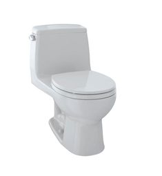 a white toilet sitting on top of a white floor