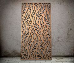 an intricately designed wooden panel on the wall