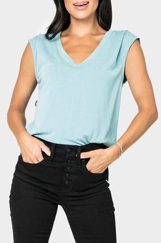 This soft and drapey knit top features a flattering pleat detail at the shoulder and can easily be dressed up or down. It is sure to become your go-to favorite V-Neck tee of the season. Women's green v-neck tee. Women's soft drape tee. Women's cupro tee. Cupro t-shirt. Green t-shirt. Cap sleeve tee. Navy Peacoat, Cap Sleeve Tee, Pink Peacock, Fern Green, Green T Shirt, Green Tshirt, The Favorite, Linen Trousers, Linen Blazer