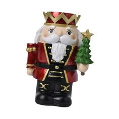 a christmas ornament with a santa clause holding a tree and wearing a crown