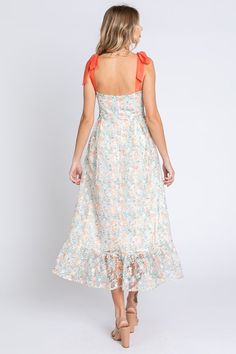 Lovelo by Gee Gee Beautiful classy embroidered sheer fabric midi dress with sweetheart neckline and self tie ribbon shoulder straps. Lined. Low back, zipper in the back. Absolutely beautiful! Color: Off White/Tangerine/Green Sizes: S-M-L Bust 32-34-36 85% Polyester, 15% Nylon, Lining 100% Rayon D1/MD50555 Tie-back Midi Dresses For Garden Party, Tie Back Midi Dress For Garden Party, Spring Dresses With Tie Straps And Fitted Bodice, Midi Length Tie Back Dress For Garden Party, Tie Back Midi Dress With Fitted Bodice For Brunch, Tie Strap Midi Dress For Garden Party, Knee-length Tie Back Midi Dress For Garden Party, Garden Party Midi Dress With Tie Back, Knee-length Midi Dress With Tie Back For Garden Party