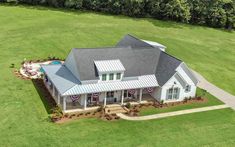 an aerial view of a house in the country