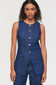 Our bestselling Leo waistcoat, now in denim pinstripe Defined, fitted silhouette with a waist split, perfect for pairing with high-waisted bottoms. Adjustable back buckle for a more fitted look Button up fastening Curved crew neckline Sleeveless Fit true to size Norman Aesthetic, Pinstripe Waistcoat, Waistcoat Outfit, Striped Outfit, 2024 Fits, Long Waistcoat, Denim Waistcoat, Curved Neckline, California Outfits