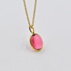 ✪Gemstone: Natural Pink Tourmaline Cabochon  ✪Metal: 18k solid gold. ✪Stone size: 6x8 mm. ✪Stone Shape : Oval. ✪Stone Weight : 1.60 Ct. ✪ Charm Weight : .460 Gram ✪Charm Length :  13 mm. ✪Charm width : 7 mm. ✪Bail size inside : 3 mm. ✪Setting type: Bezel wire setting. If you need any other preferred stone please contact us. Tourmaline benefits - *Tourmaline is believed to promote inspiration and happiness, reduce fear, and build self-confidence among its users.  *It's also used to balance yin-yang energies, as it's considered a physical bridge to the spiritual.  *Tourmaline comes in a variety of colours, the most common being black. QUALITY OF MATERIALS: Metal: Most of our jewelry at JewelryMansion is made with precious metals like gold and silver. These metals are 100% non-allergic to our Bezel Wire, Birthstone Gifts, Gold Stone, Handmade Charms, October Birthstone, Oval Stone, October Birth Stone, Pink Tourmaline, Self Confidence