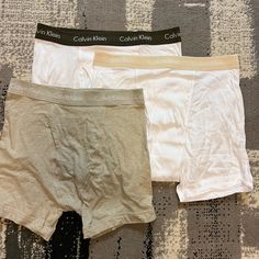 3 Pairs Of Calvin Klein Cotton Boxer Briefs. Size Large. Never Worn Just Ordered Wrong Size. 2 White Pairs Are 100% Cotton 1 Beige Pair Is Cotton Stretch Material Nwot Calvin Klein Casual Multi-pack Bottoms, Fitted Calvin Klein White Boxer Briefs, Fitted White Calvin Klein Boxer Briefs, Calvin Klein Fitted White Boxer Briefs, Casual White Boxer Briefs Multi-pack, Calvin Klein White Cotton Boxer Briefs, Casual White Calvin Klein Boxer Briefs, Casual Calvin Klein Cotton Boxer Briefs, Calvin Klein Casual Cotton Boxer Briefs