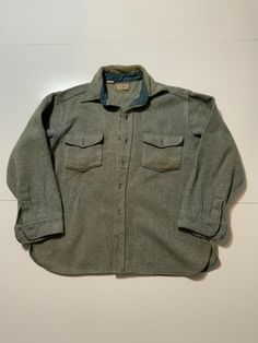 Vintage L.L. Bean Freeport Maine Northwoods Tweed Wool Shacket Flannel Shirt. Size XL. Condition is used. Measures approximately: chest: 48 inches around (24 inches pit to pit), shoulder to hem line: 27 inches, shoulder seam to cuff: 23 inches. Staining throughout shirt and missing all buttons and distressing on arm cuffs please see pictures for details. Great buy Thanks for looking. Casual Cotton Tweed Jacket With Pockets, Casual Wool Button-up Tweed Jacket, Casual Button-up Wool Tweed Jacket, Casual Button-up Tweed Jacket, Casual Cotton Tweed Jacket, Vintage Long Sleeve Tweed Jacket With Button Closure, Long Sleeve Hunting Tops For Fall, Long Sleeve Tops For Hunting In Fall, Classic Wool Flannel Shirt With Pockets