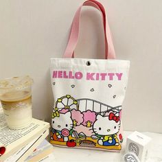 Adorable Hello Kitty Commuter Canvas Bag Authorized Sanrio Cartoon Design,Bag Durable, Water-Resistant, Perfect For School, Work & Travel Officially Licensed Product Good Quality! Fun Design! Pink Cartoon Print Travel Bag, Rectangular Bags With Cartoon Print For Daily Use, Trendy Bags With Cartoon Print For Daily Use, Trendy Cartoon Print Bags For Daily Use, Cute Bags With Cartoon Print For Everyday Use, Cute Everyday Pouch Canvas Bag, Cute Cartoon Print Bags For Everyday Use, Cute Everyday Bags With Cartoon Print, Pink Cartoon Bag For Everyday Use