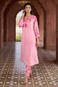 Cherry blossom pink kurta with prints, tassels, coin and sequin work. Comes with matching printed pant. - Aza Fashions Unstitched Pink Sets With Printed Motifs, Silk Long Sleeve Pink Sets, Pink Silk Long Sleeve Sets, Pink Straight Kurta Set With Dabka, Pink Straight Kurta Sets With Dabka Detail, Elegant Pink Palazzo Set With Printed Motifs, Pink Floral Print Palazzo Set For Eid, Elegant Pink Sets With Printed Motifs, Pink Long Sleeve Pant Set For Spring