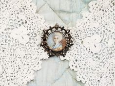 "Antique French brooch, hand painted miniature on porcelain of a lady in Marie Antoinette costume, brooch with miniature & micro pearls. DESCRIPTION: Very lovley antique French brooch with a hand painted miniature on porcelain featuring a lady in Marie Antoinette costume, framed in silver color openwork metal with micro pearls, dating to early 1900's. HOW TO USE IT: A beautiful antique brooch with delightful miniature of lady, perfect gift for Valentine's Day! CONDITION: Good antique condition. Victorian Style Enamel Pin Gift, Victorian Style Wedding Brooch Enamel Pin, Victorian Wedding Enamel Brooch Pin, Victorian Style Wedding Enamel Brooch Pin, Marie Antoinette Costume, Antique Brooches, Marie Antoinette, A Lady, French Antiques