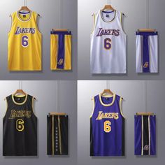 basketball uniforms hanging on the wall in different styles and colors, including lakers's number six