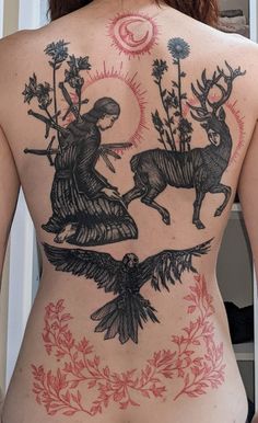 the back of a woman's body with an image of two deers on it