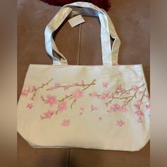 Nwt Tote Bag. Cherry Blossom Print. Inside Bag Is Lined In Pink With Zippered Pocket. Beautiful Bag Large Capacity Canvas Bag For Spring, White Canvas Bag For Spring, Spring Floral Print Canvas Bag, Pink Cotton Shoulder Bag For Spring, Spring Pink Cotton Shoulder Bag, Spring Shopping Canvas Bag, Spring Canvas Shopping Bag, Spring Floral Canvas Shopping Bag, Spring Travel Canvas Bag