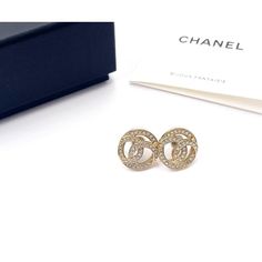 Chanel Gold CC Round Crystal Piercing Earrings *Marked 19 *Made in France *Comes with the original box and pouch -It is approximately 0.55″ x 0.55″. -Very beautiful and classic -In a pristine condition AB2159-00547  Please see the measurements section for best approximate dimensions. Piercing Earrings, Prada Designer, Balenciaga Designer, Made In France, Luxury Bags, The Original, Original Box, Bags Designer, Saint Laurent