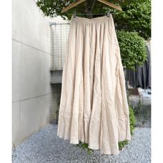 💃 The skirt comes with an elastic waistband and is standardly designed to fit waist from 24 to 36 inches. For alternative sizing, please contact us to arrange a custom fit. This elegant skirt is not just a garment; it's a wearable expression of serenity and sophistication. With its double-layer design, it offers a chic solution to see-through worries, allowing you to move with confidence and grace. 🌸 The flowing, wide hem adds a touch of drama to every step, making this the perfect skirt for t Fitted Beige Maxi Skirt With Elastic Waistband, Beige Fitted Maxi Skirt With Elastic Waistband, Relaxed Fit Gathered Midi Skirt, Fitted Beige Skirt With Elastic Waistband, Beige Fitted Skirt With Elastic Waistband, Long Gathered Skirt With Relaxed Fit, Relaxed Fit Long Gathered Skirt, Casual Beige Full Skirt Bottoms, Flowy Beige Maxi Skirt With Elastic Waistband