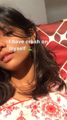 a close up of a person laying on a bed with the words i have crush on my self