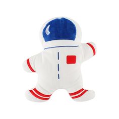 a white stuffed toy with red and blue stripes on it's chest, wearing a space suit