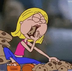 a cartoon character sitting on the ground with her mouth open