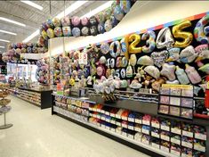 a store filled with lots of toys and balloons