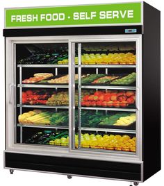 a refrigerated display case with fresh food on the bottom and shelves full of fruits and vegetables