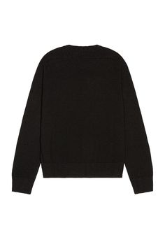 Find SAINT LAURENT Crew Neck Sweater on Editorialist. Saint Laurent Crew Neck Sweater in Black 100% cashmere. Made in Italy. Hand wash. Lightweight knit fabric. Rib knit trim. SLAU-MK27. 603089YALL2. About the designer: SAINT LAURENT has been influencing and revolutionizing the fashion industry since the debut of its iconic ‘Rive Gauche’ collection in 1966 - the couture house was the first to create a ready-to-wear capsule. The sleek, precisely tailored staples, like the signature biker jackets, transcend seasons and trends. Creative Director Anthony Vaccarello continues to honor the label’s illustrious reputation by reintroducing cult styles, including the ‘Lou’ handbag and ‘Tribute’ sandals. Designer Black Sweater With Ribbed Cuffs, Designer Long Sleeve Cashmere Tops, Luxury Black Long Sleeve Sweater, Black Crew Neck Cardigan With Relaxed Fit, Black Relaxed Fit Crew Neck Cardigan, Luxury Black Sweater With Ribbed Collar, Black Relaxed Fit Cardigan, Luxury Black Wool Cardigan, Luxury Black Winter Sweater