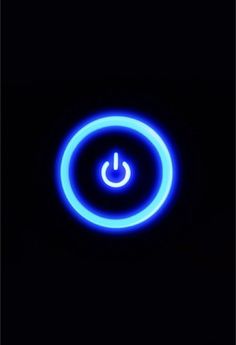 a black background with a blue circle and a white light in the middle that has a smiley face on it