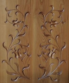 wood carving designs on the side of a door