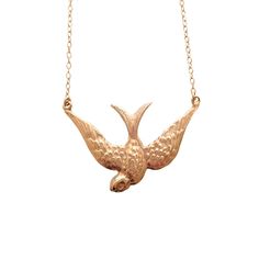 The Large Swallow Necklace is a perennial favorite and one of the foundations of the collection. A golden swallow in the sun, a symbol of a safe return home. Delicate and detailed and perfect for everyday wear. Romantically styled and Victorian-inspired, the incredible detailing, pleasing heft and perfect balance make it a truly signature piece. Pendant is approximately 1" length Fashioned on 18" chain with a secure lobster clasp Handcrafted in sterling silver, 14k vermeil, and 14k gold with 1mm Elegant Gold Jewelry With Bird Design, Elegant Gold Necklace With Bird Design, Swallow Necklace, Gold Vermeil, Silver Necklaces, A Symbol, Lobster Clasp, The Collection, Gold Necklace