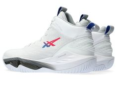 a pair of white sneakers with blue and red accents on the upper part of the shoe