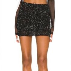 Brand New, Never Worn, Black Mini Sequin Skirt, Tag Says Size 10 But Fits Like Size 6, Has Stretch, Zip Back Closure, Extra Sequins. Maybe Missing Sequins(See Last 2 Photos Same Spot, Up Close/At Distance). Not Noticeable. Full Lined. Length 15” Waist 14.5” Stretches To 17” Hem 18” Glamorous Black Sequined Mini Skirt, Chic Pencil Skirt Bottoms For Party Season, Black Sequined Mini Skirt For Spring, Evening Mini Skirt Bottoms With Sequins, Glamorous Black Mini Skirt For Party Season, Sequin Skirt Bottoms For Night Out, Fitted Sequin Mini Skort, Fitted Mini Skort With Sequins, Fitted Sequin Skirt