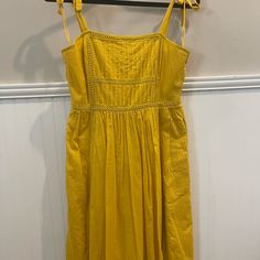 Golden Yellow Dress Nwt Chic Yellow Cotton Sundress, Casual Yellow A-line Midi Dress, Yellow Cotton A-line Midi Dress, Yellow Cotton Midi Sundress, Yellow Casual Knee-length Sundress, Yellow Knee-length Casual Sundress, Casual Yellow Knee-length Sundress, Casual Yellow A-line Dress, Chic Yellow Cotton Dress