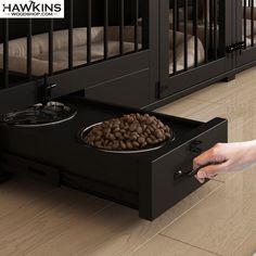 a person reaching into a dog bed with food in the bottom drawer on the floor